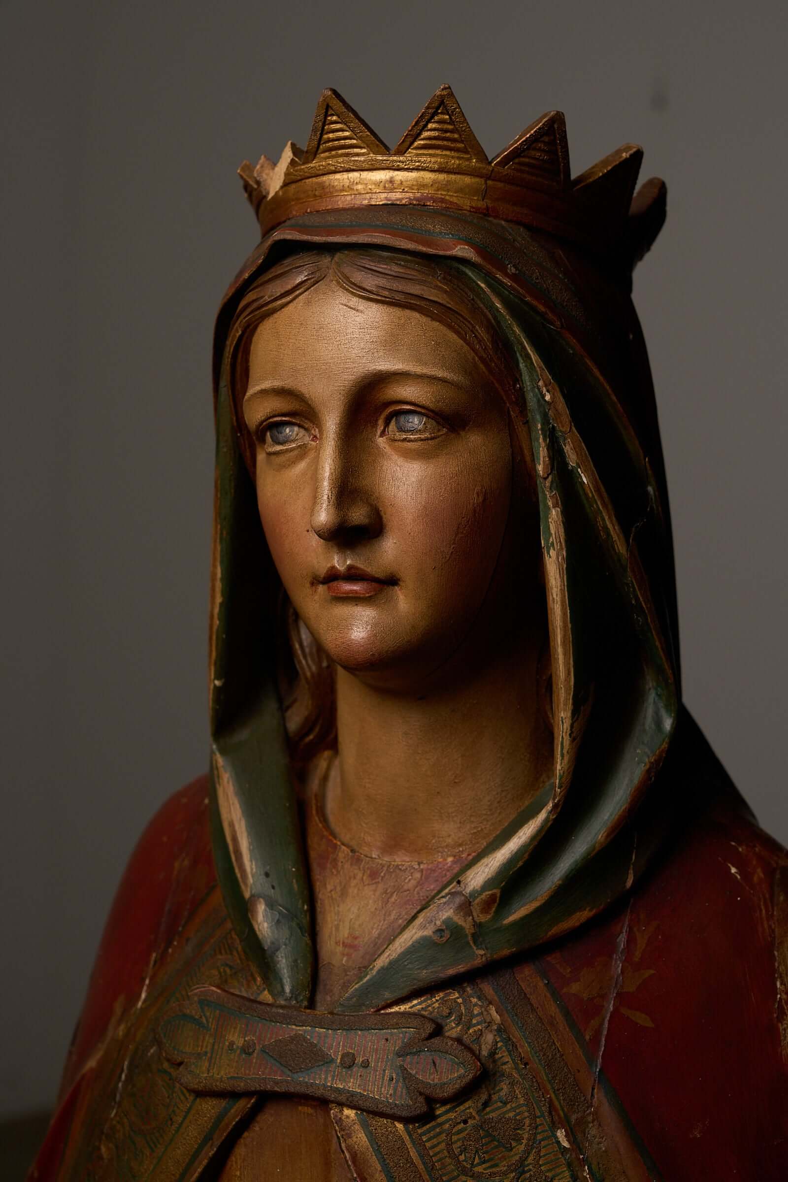 Antique Flemish Polychrome Statue of Saint Barbara, featuring intricate hand-carved details and a serene expression.