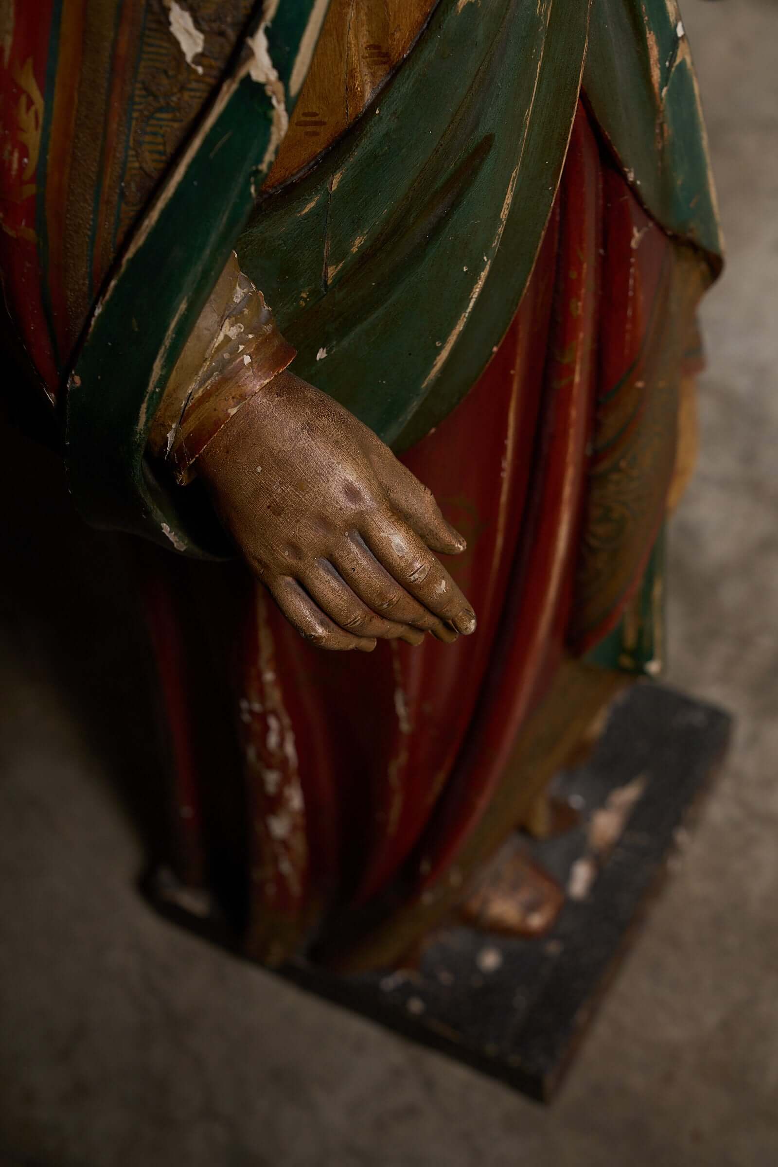 Antique Flemish Polychrome Statue of Saint Barbara hand detail with intricate carving and vibrant colors.