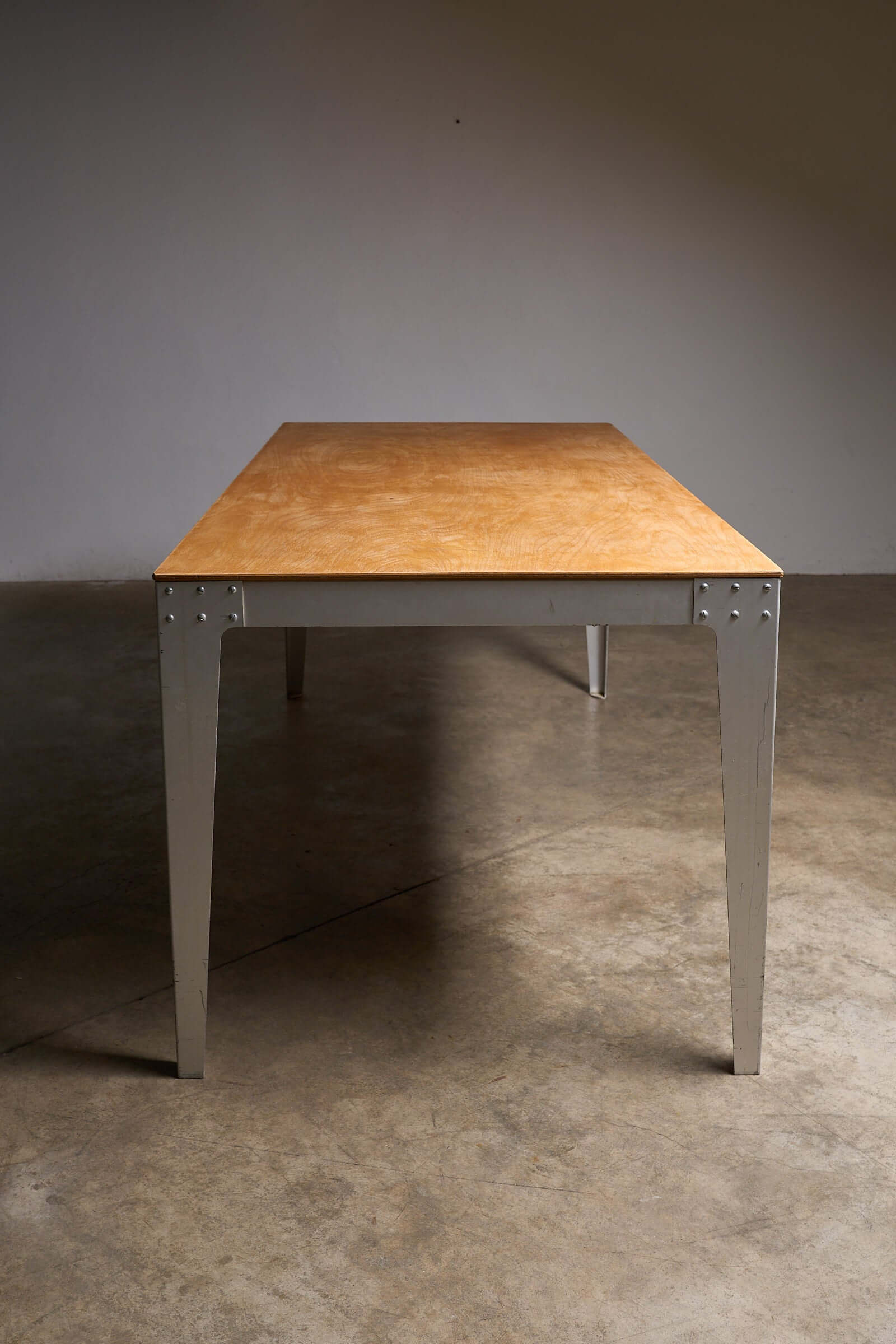 Piet Hein Eek Industrial Aluminium and Plywood Dining Table showcasing a plywood top and metal base.