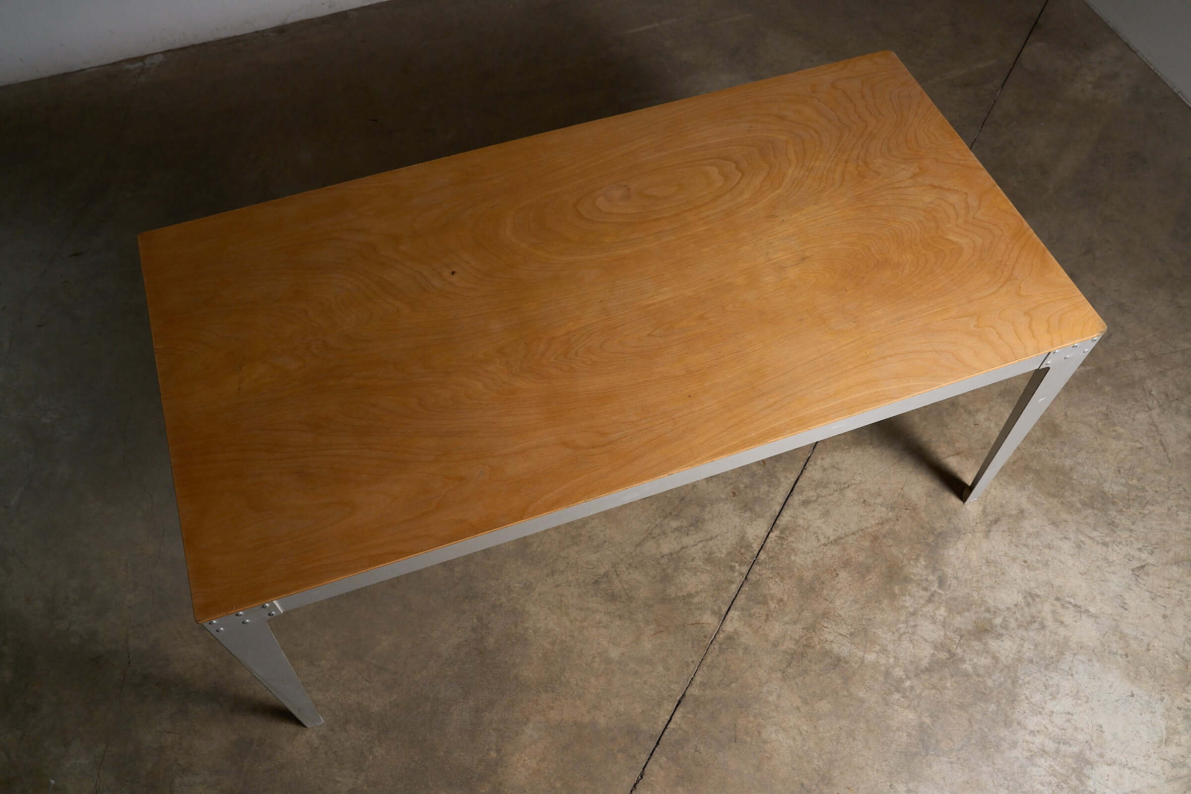 Piet Hein Eek Industrial Aluminium and Plywood Dining Table showcasing plywood top and aluminium legs.