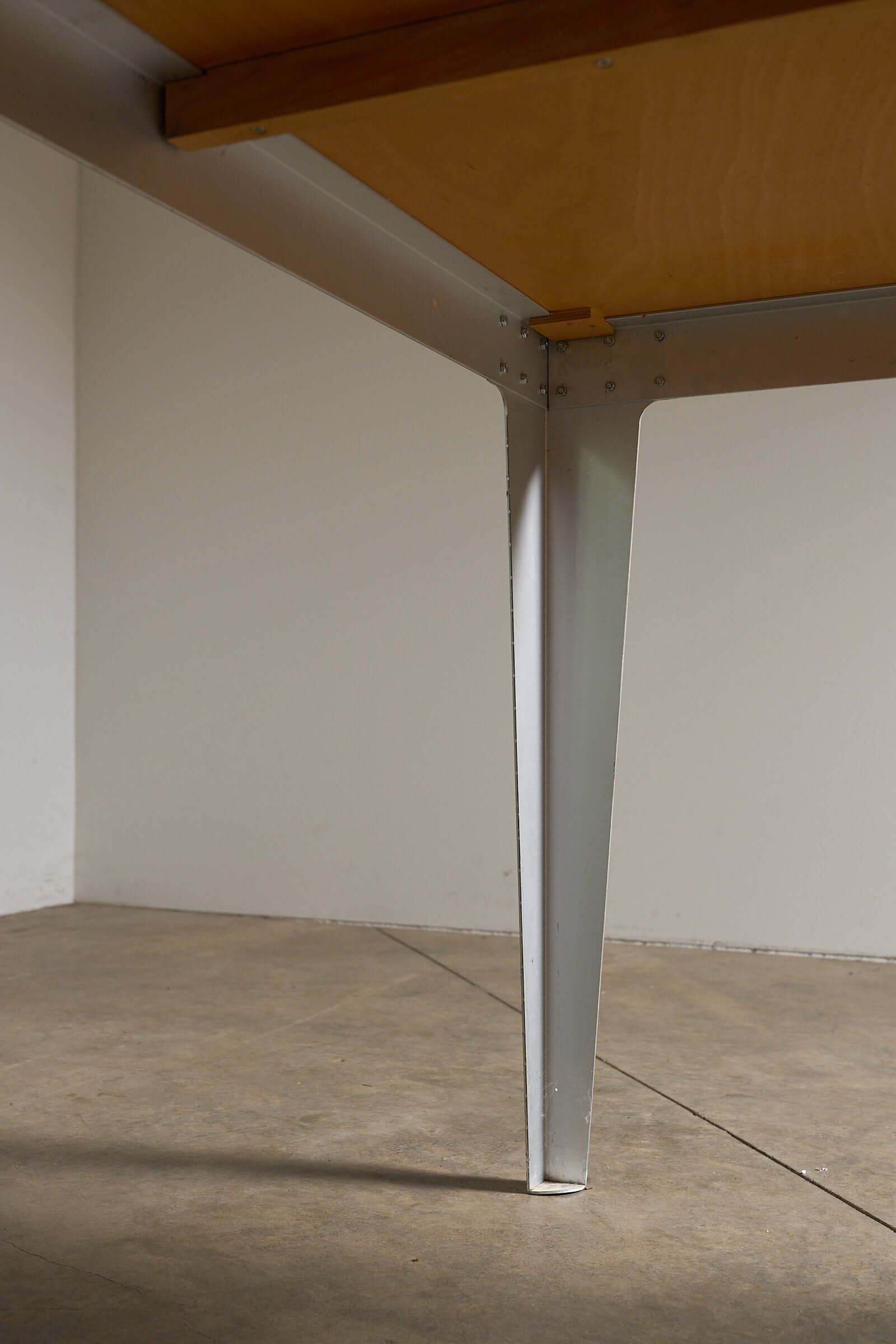 Piet Hein Eek Industrial Aluminium and Plywood Dining Table leg detail showcasing utilitarian design and craftsmanship.