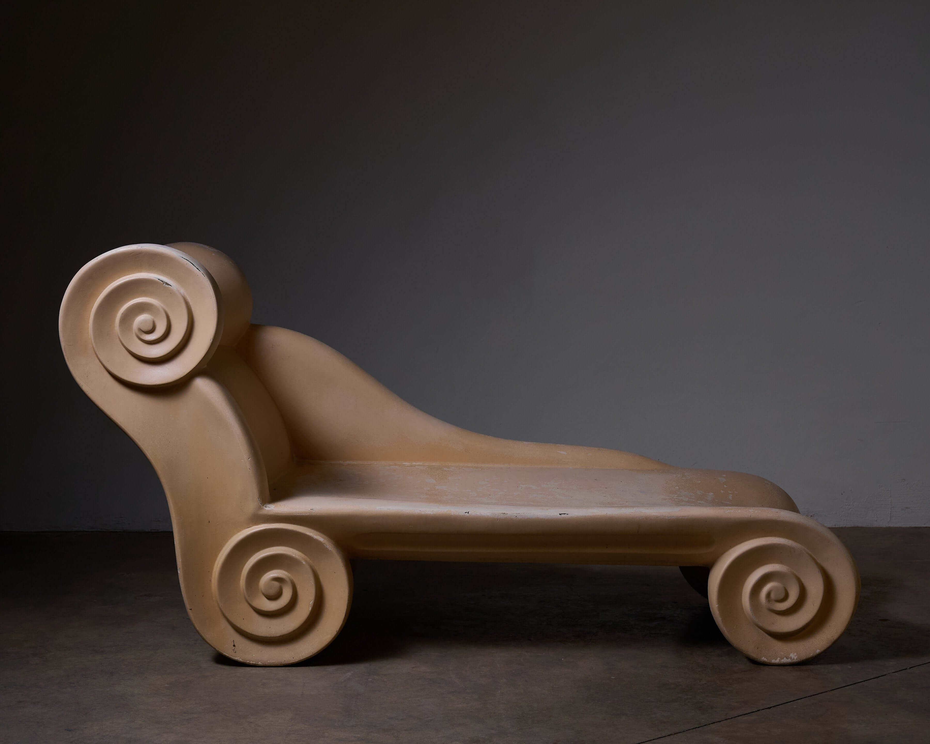 Ionic Column Chaise Longue in a sculptural design with distinctive scroll details from the 1980s Postmodern era.