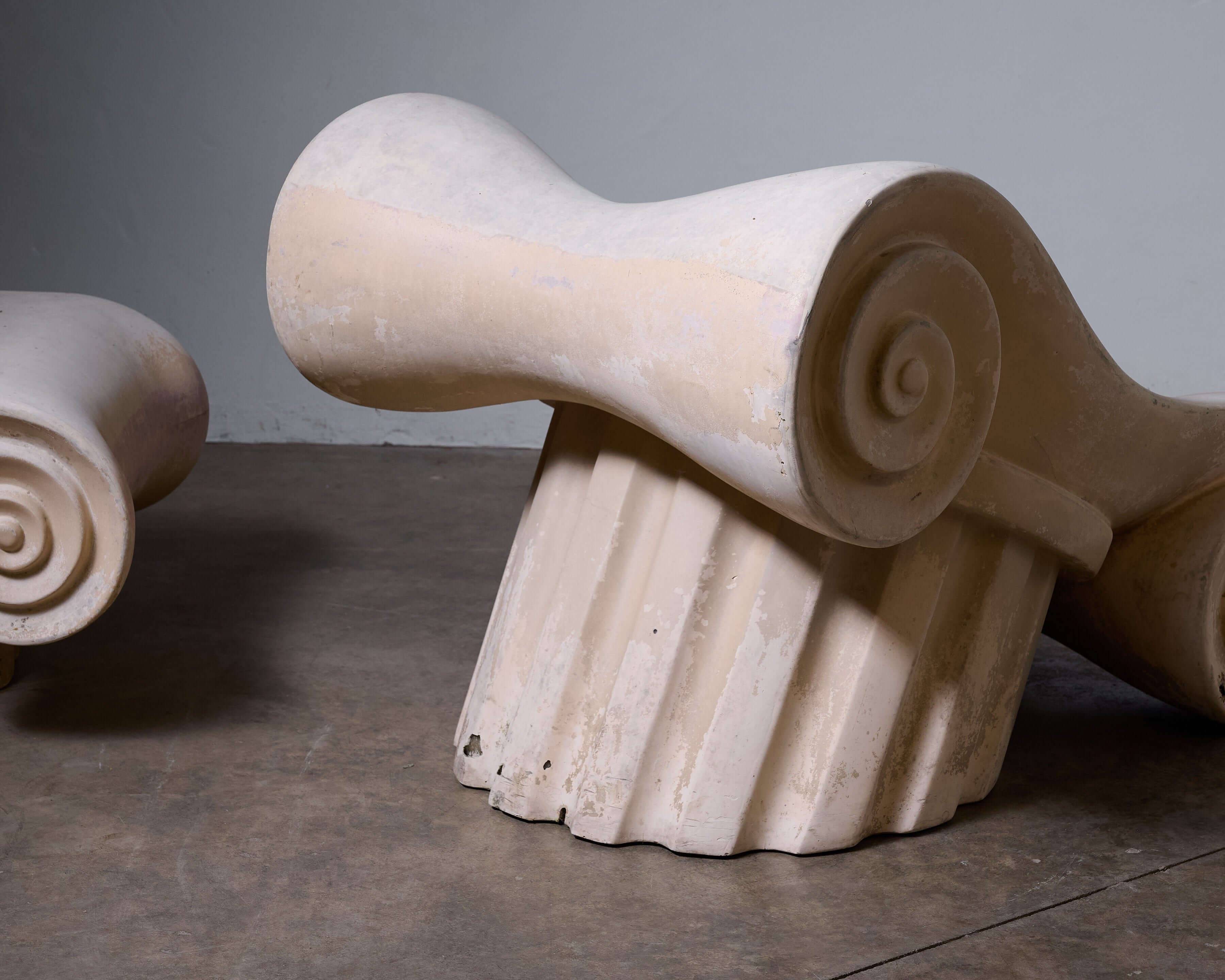 'Capitello' Chair with Ottoman, unique design inspired by ancient Greek architecture.