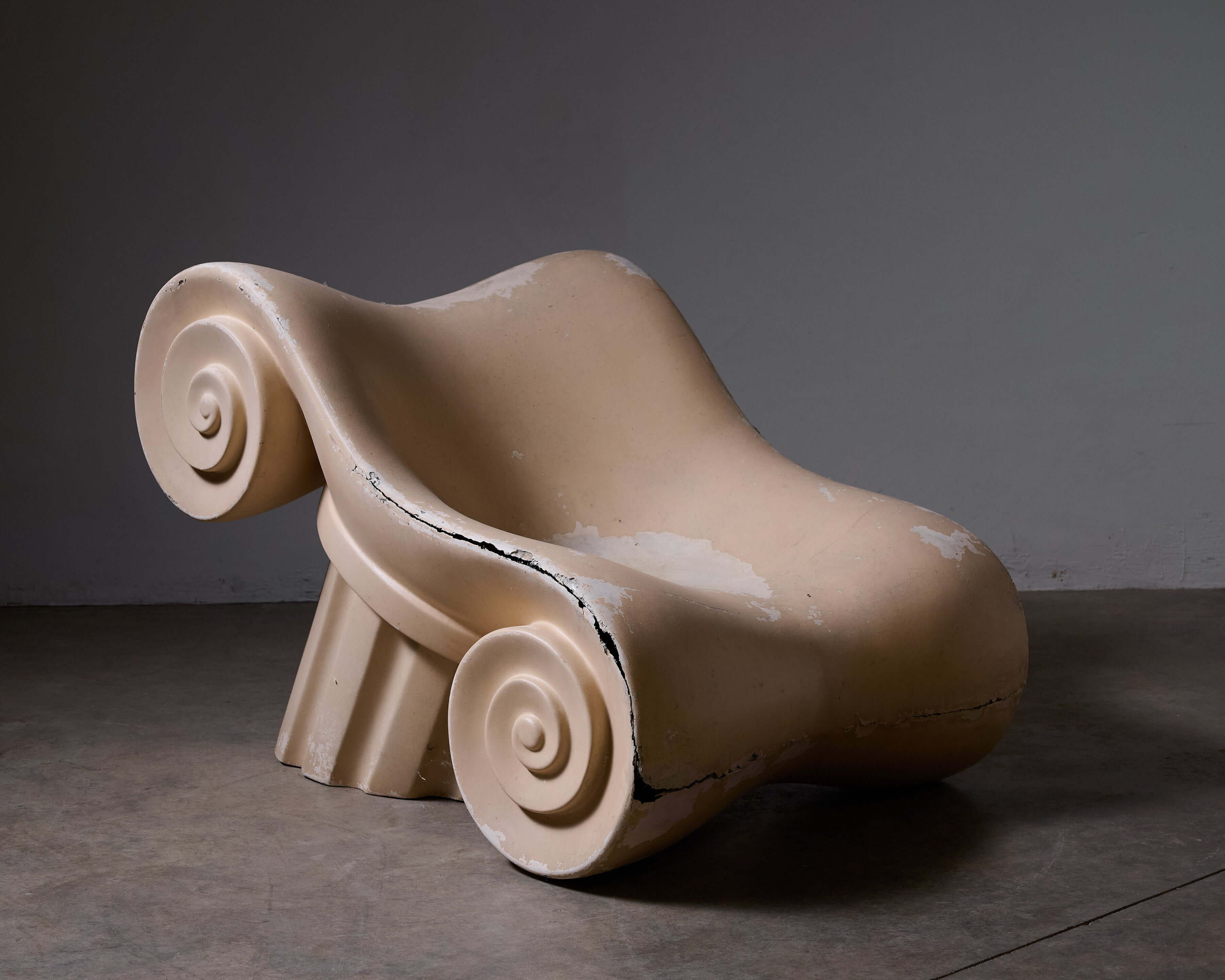 Capitello' Chair designed by Studio 65, inspired by ancient ruins of the Acropolis, suitable for stylish interiors.