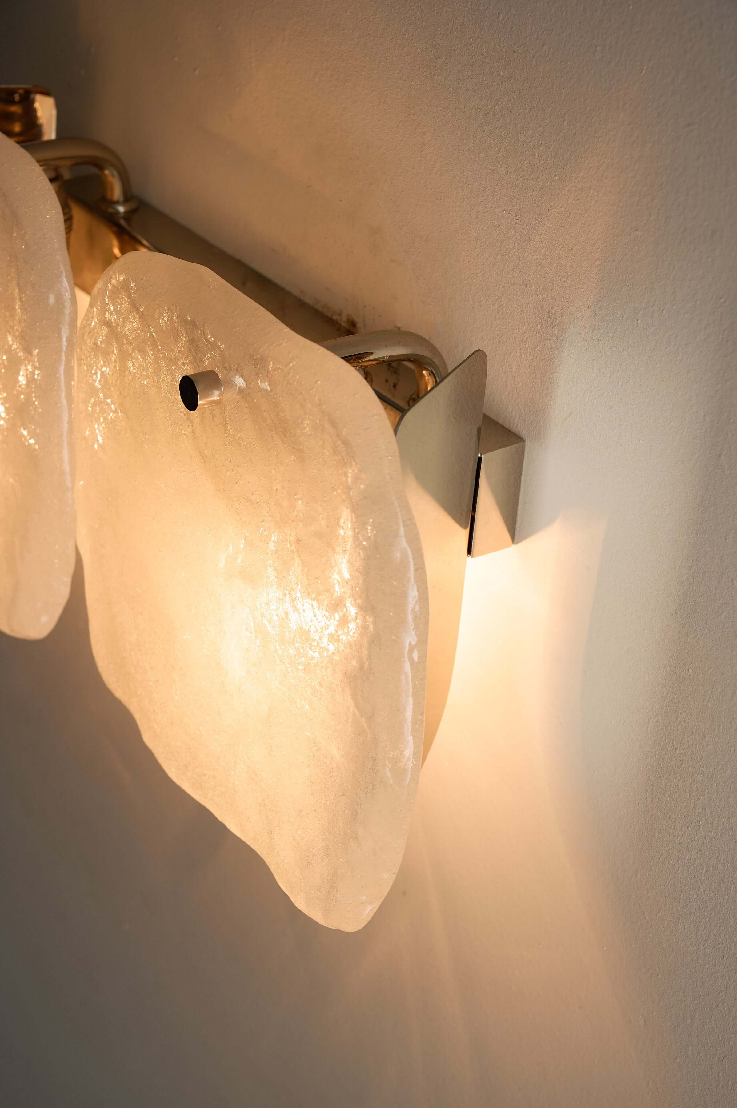 Kalmar Franken 'Ice Glass' Wall Sconce Model 4483 showcasing textured glass panels and chrome-plated backplate.